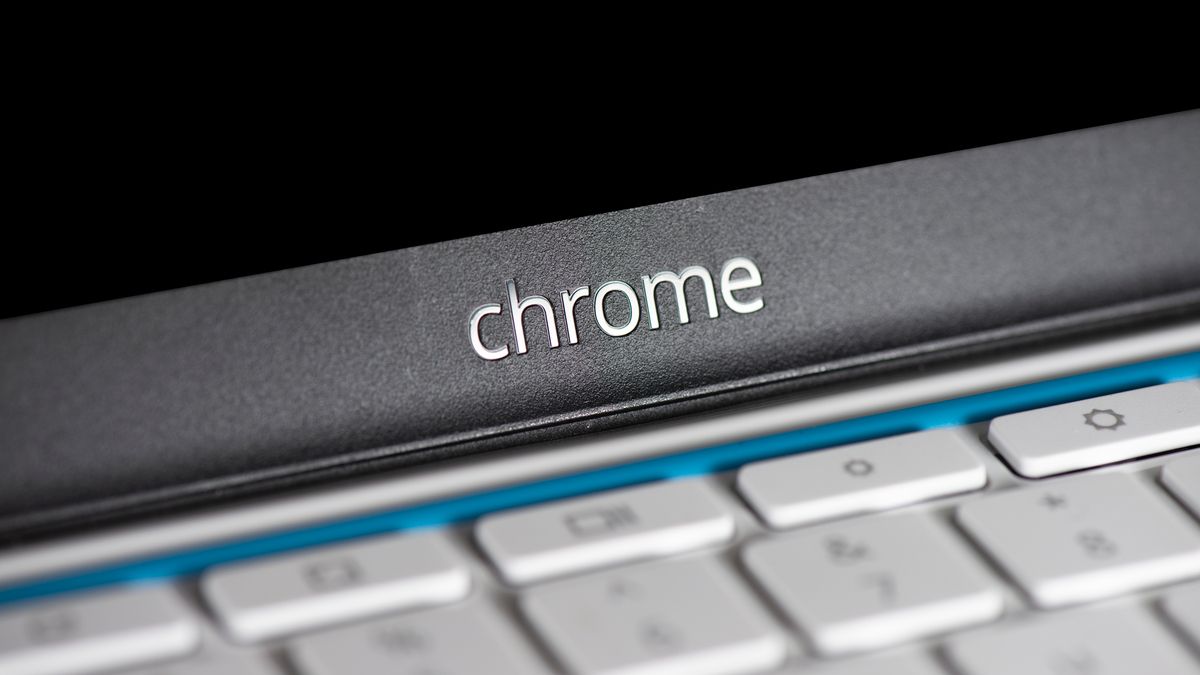 Chrome logo over a Chromebook's keyboard