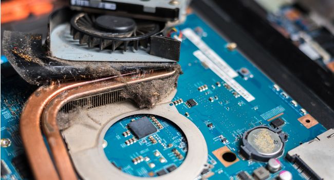 Dust build up inside a laptop fan
