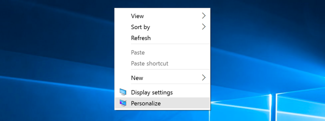 Right-click the desktop and select &quot;Personalize.&quot;