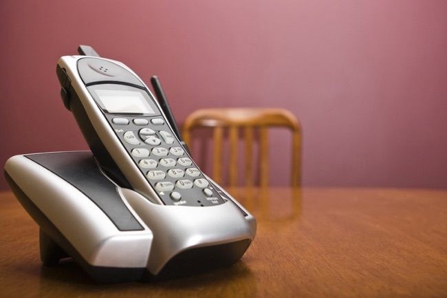 Cordless Phone On A Table With Chair