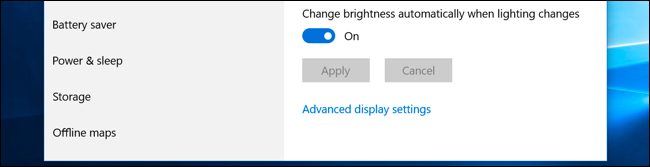 The &quot;Change brightness automatically when lighting changes&quot; option in Windows 10's Settings app.