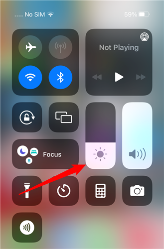 Hard Press the brightness slider to display the night shift toggle on iOS 15.