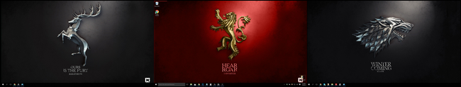 Game of Thrones themed backgrounds randomly arranged on three desktops. 