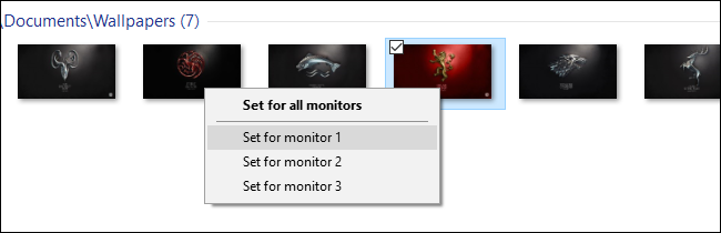 Right-click an image, then select "Set For Monitor 1," or whichever monitor you'd like. 