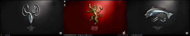 The Game of Thrones backgrounds arranged deliberately on a triple monitor setup. 