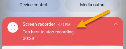Select the notification to stop recording.