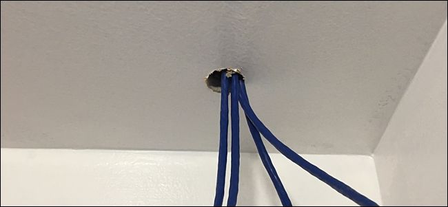 Running security camera hot sale wires into house