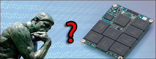 The Thinker statue next to an SSD without a case. 