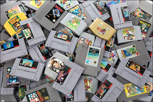 A pile of Nintendo 64 game cartridges 