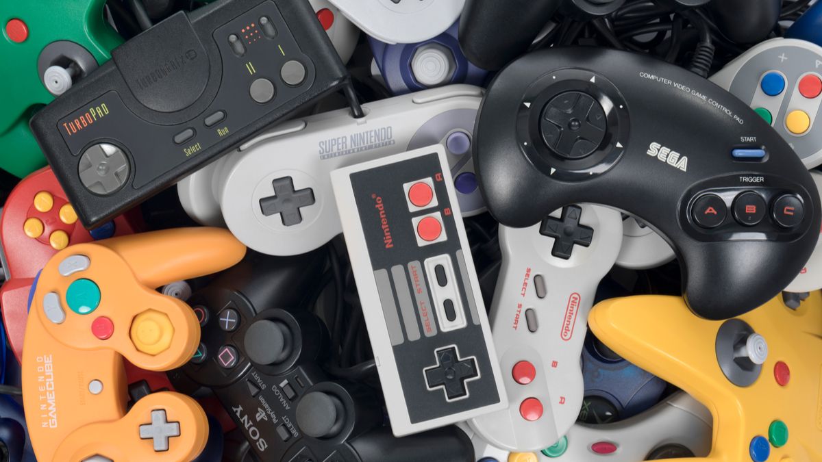 Classic video game controllers in a pile
