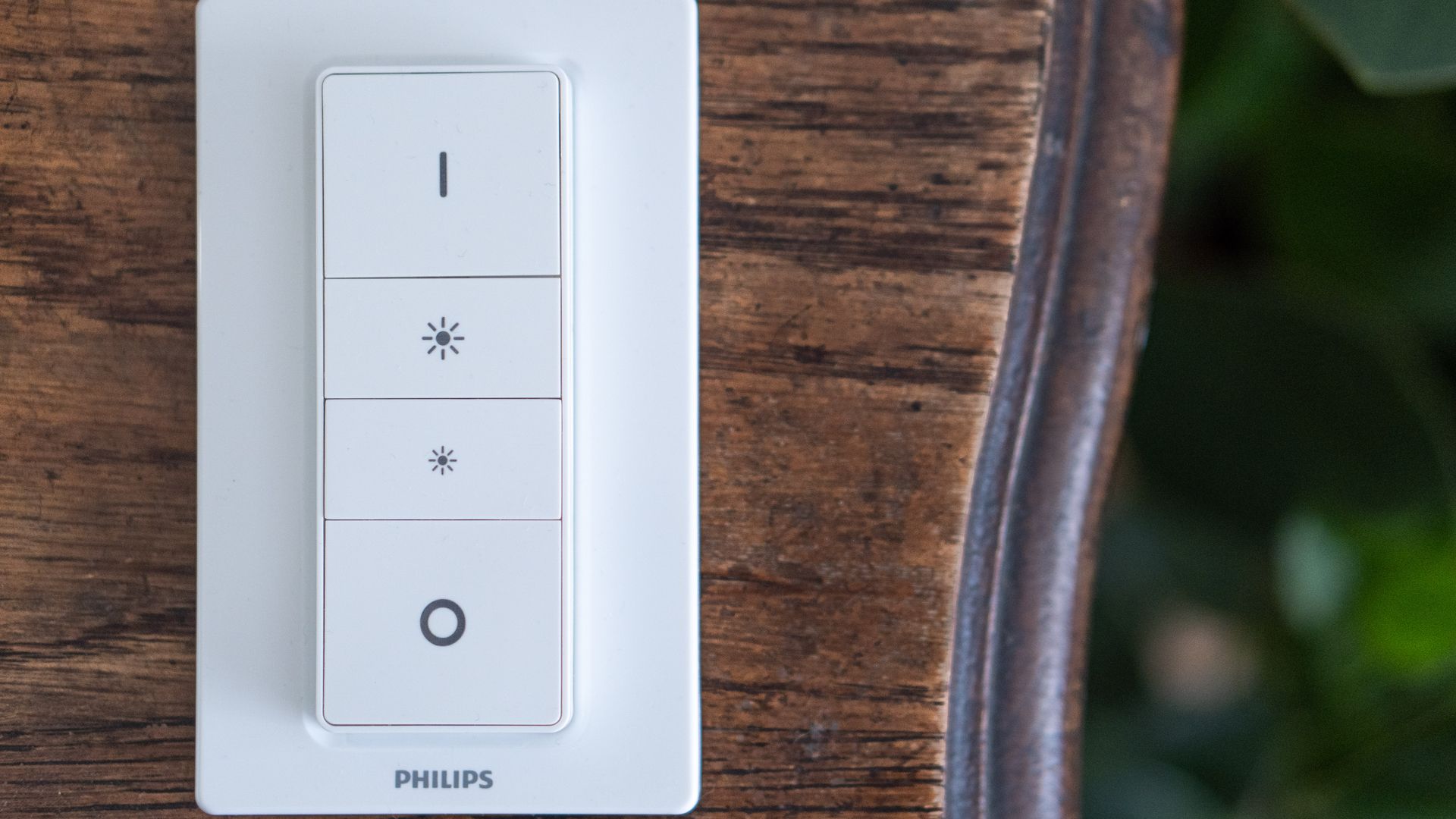 A Philips dimmer switch on an outdoor surface