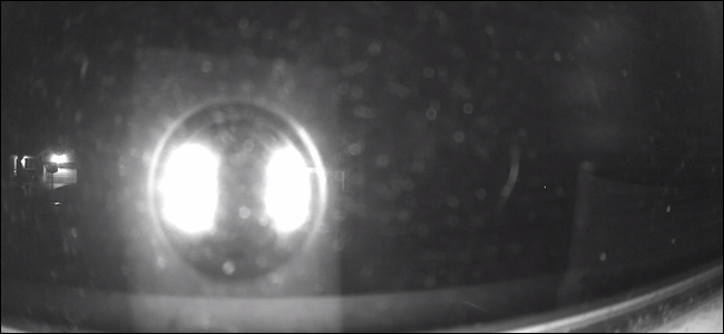 Wyze Cam with night vision LEDs lit, most of the picture is obscured by bright lights