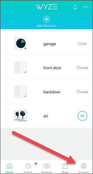 Wyze app with arrow pointing to account button.