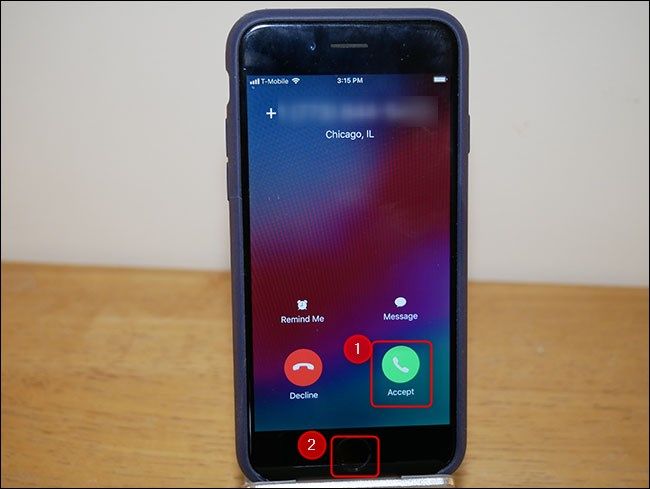 Accept the call, and press the home button