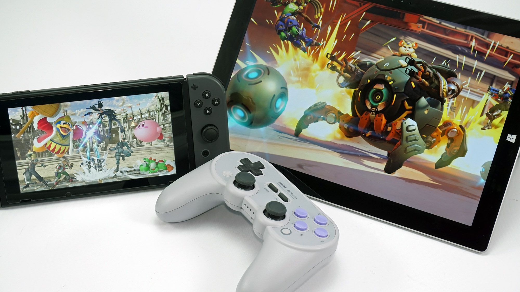the SN30 Pro+ controller with a Surface tablet and Nintendo Switch console