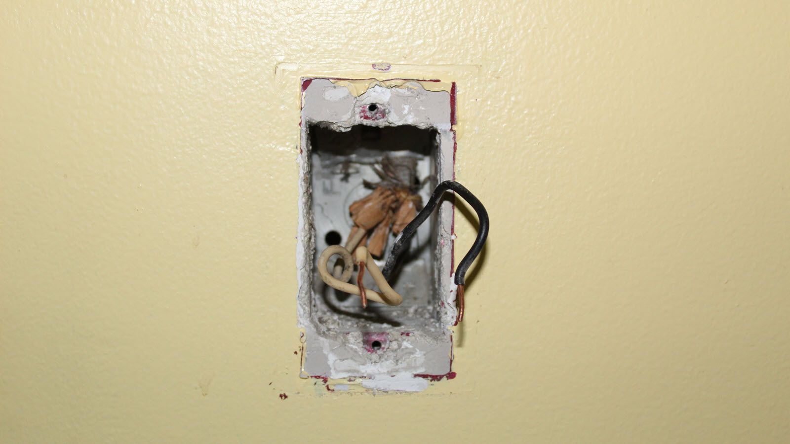 A light switch gang box with just two wires.