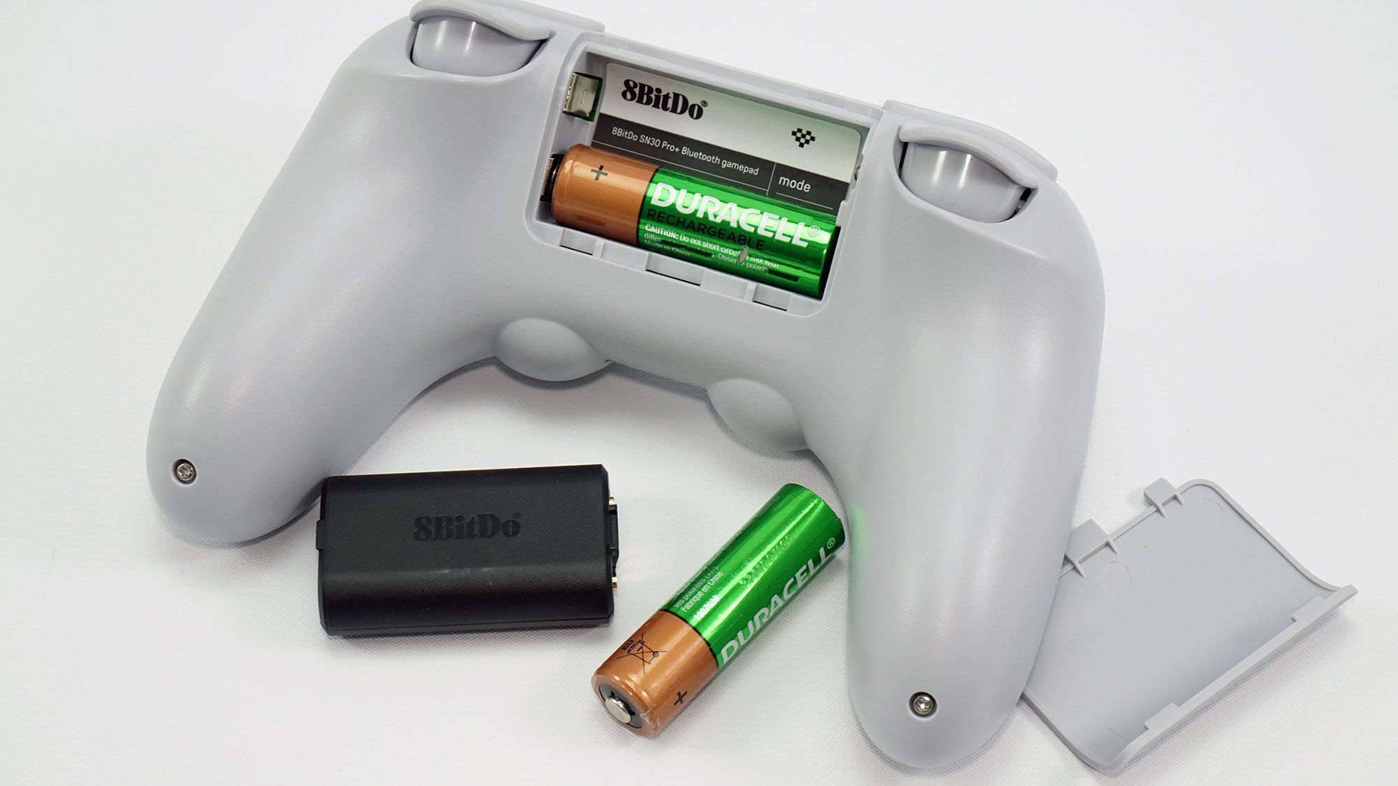 The SN30 Pro+ with rechargeable battery pack and AA batteries.