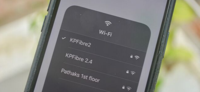 Selecting a different Wi-Fi network from the popup in Control Center on iPhone on iOS 13