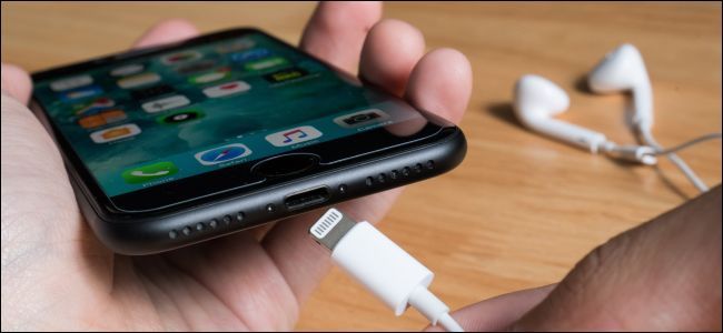 Connecting a Lightning cable to an iPhone