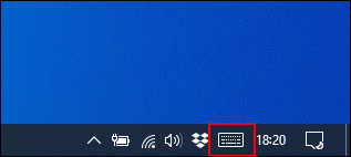 Click the on-screen keyboard icon in the Windows taskbar notifications area