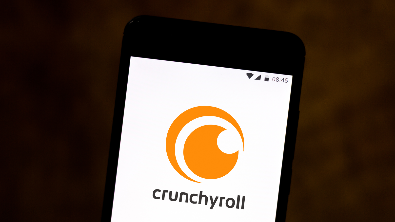 Crunchyroll logo on a phone