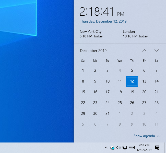 Windows 10's clock panel showing the time in three time zones.
