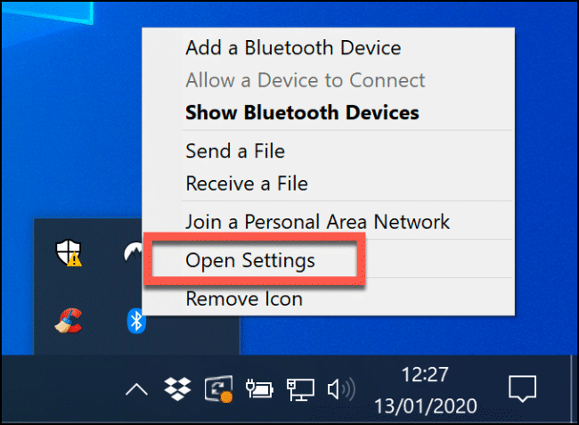 Right-click the Bluetooth icon and click Open Settings to open the Bluetooth settings on Windows
