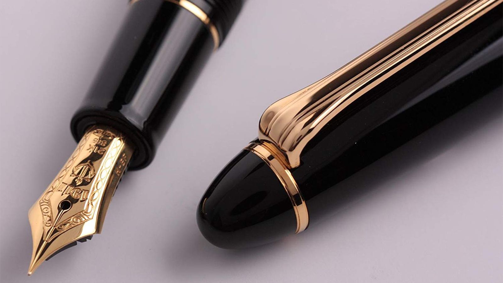 The gold-plated nib and cap of the Sailor Profit Fountain Pen in Black.