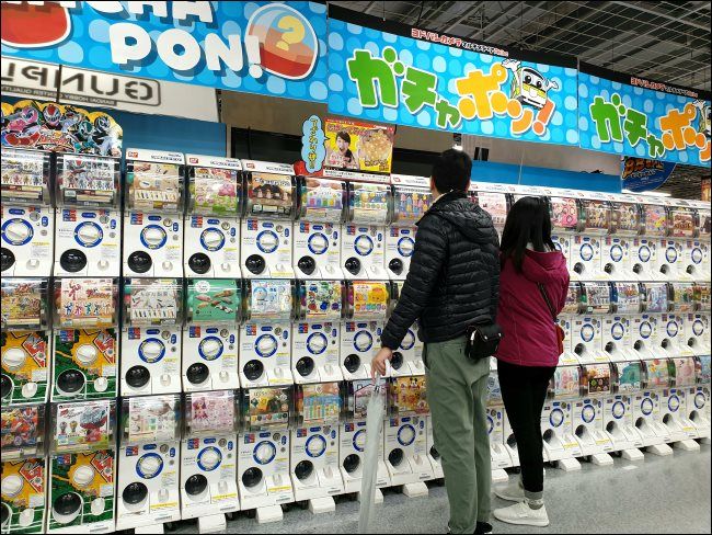 Gachapon machines in an electronics store in Japan.