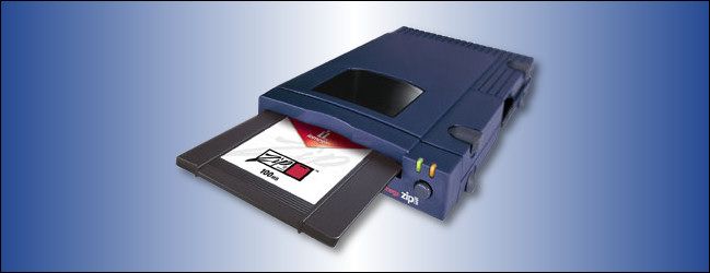 An Iomega Zip Drive on a dynamic blue background