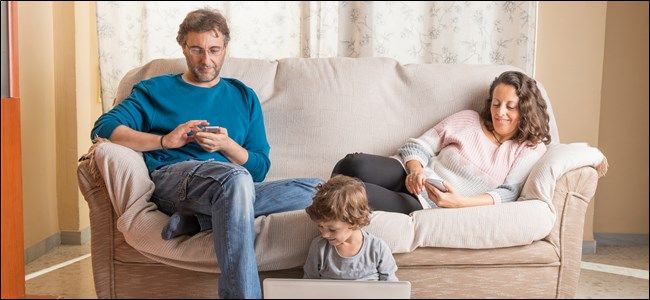 Family At Home On Electronics