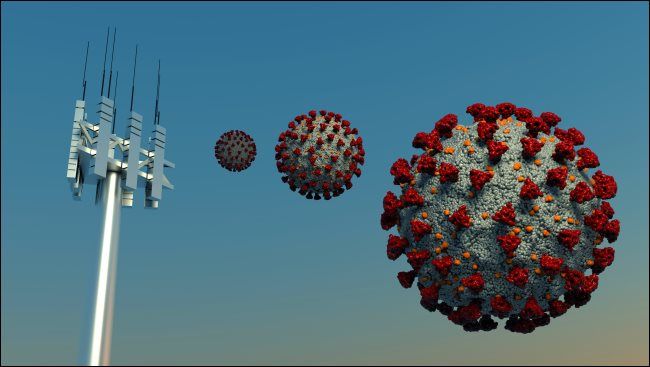 A 5G antenna with an illustration of the novel coronavirus that causes COVID-19.