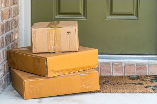 Three packages on a doorstep.