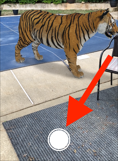 You can now see the 3D object or animal and tap the shutter button to snap a photo