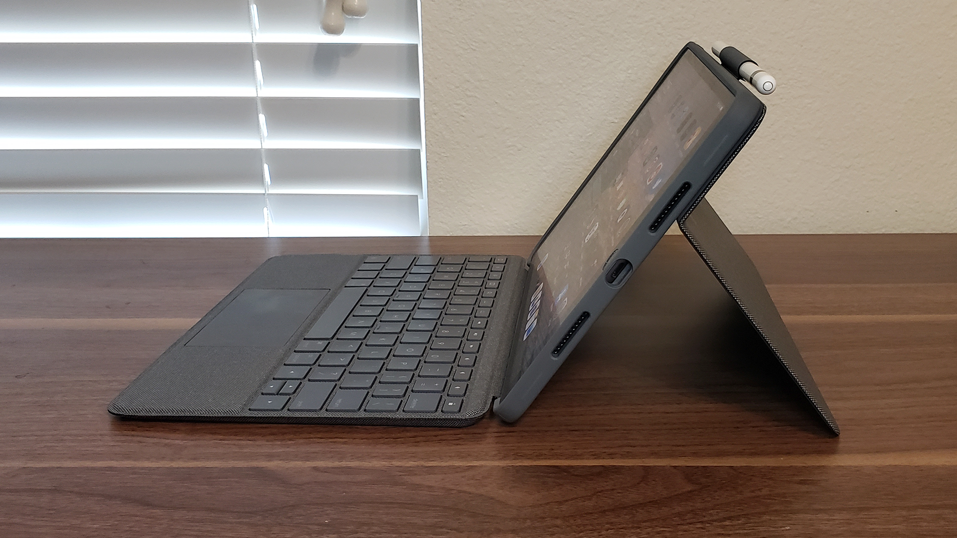 The Combo Touch takes up around a foot of space when extended---more than a laptop.