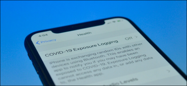 iPhone user checking COVID-19 Expsoure Notifications page to see how it works