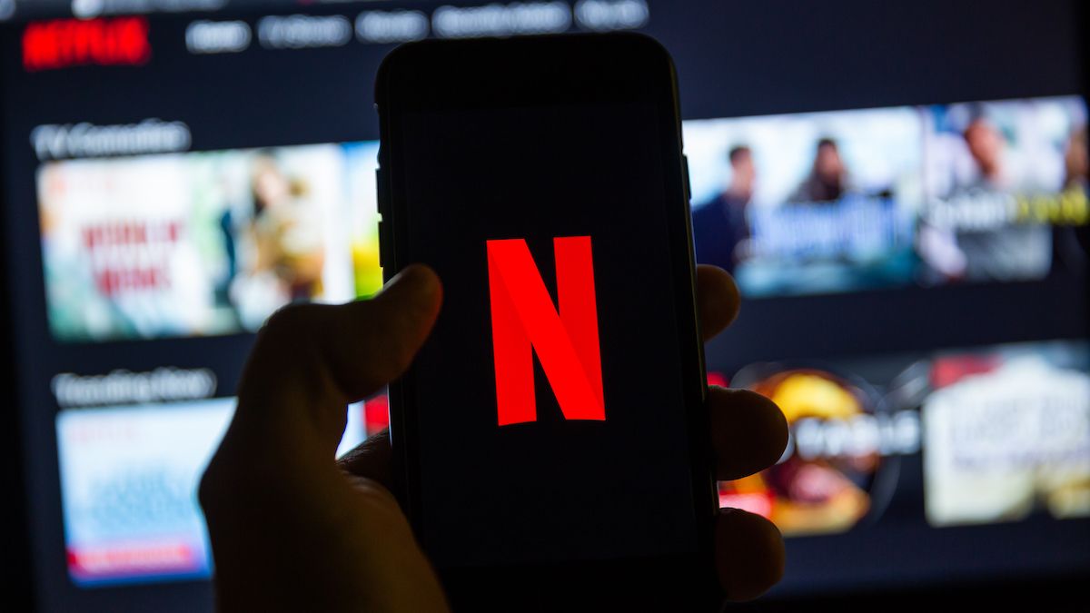 Netflix logo on a smartphone and computer screen