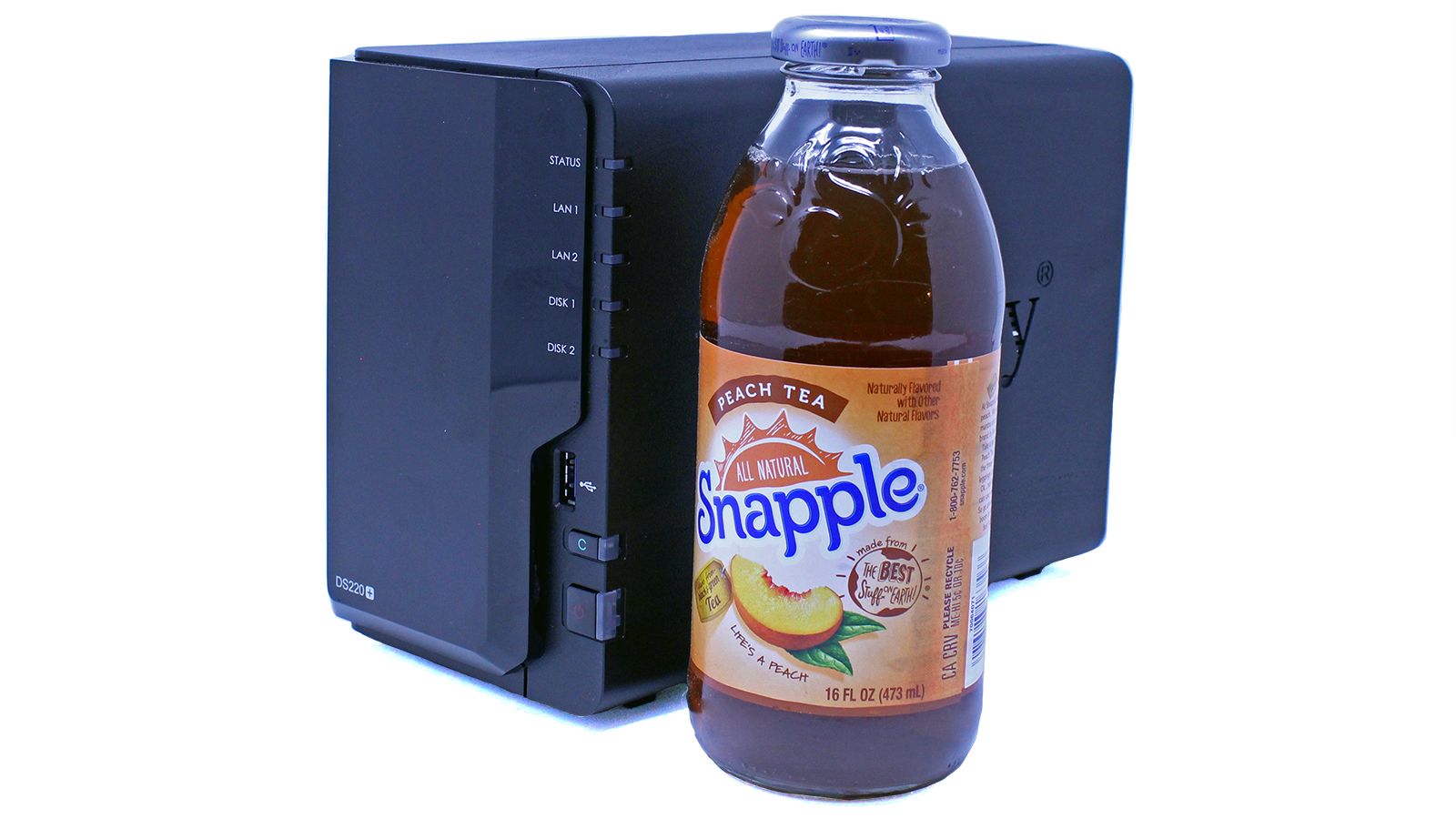 A DS220+ NAS next to a Snapple.