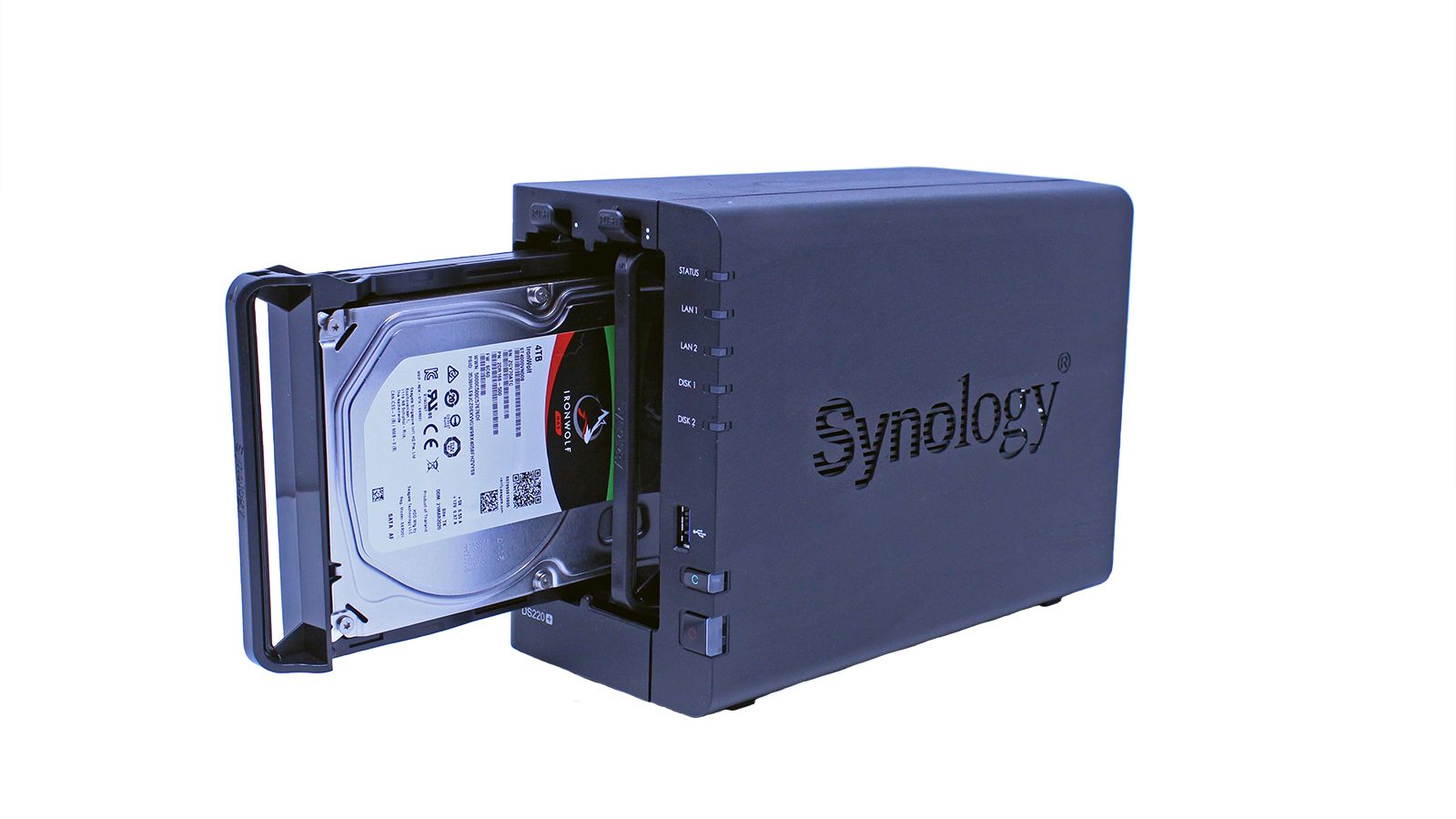 The Synology DS220+ NAS with one drive slid out.