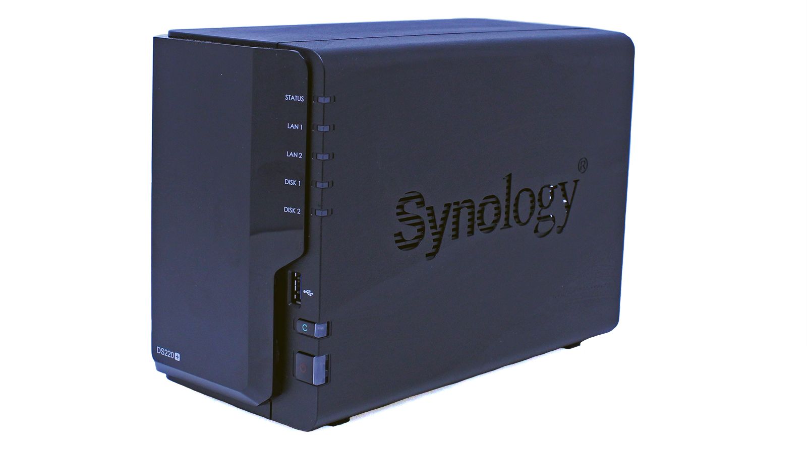 The Synology DS220_ NAS seen from the right, showing the power button and one-touch copy button.