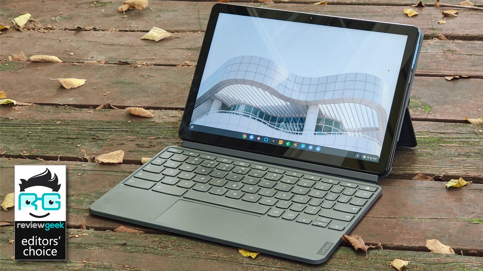 The Lenovo IdeadPad Duet on a wooden deck with leaves all around