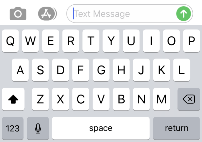 An iPhone on-screen keyboard with no Emoji button
