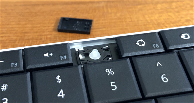 A keyboard key with a removed keycap