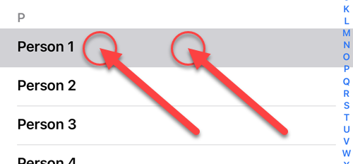 Tap and hold a contact with two fingers.