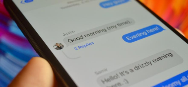 User creating in-line replies in iMessage group on iPhone