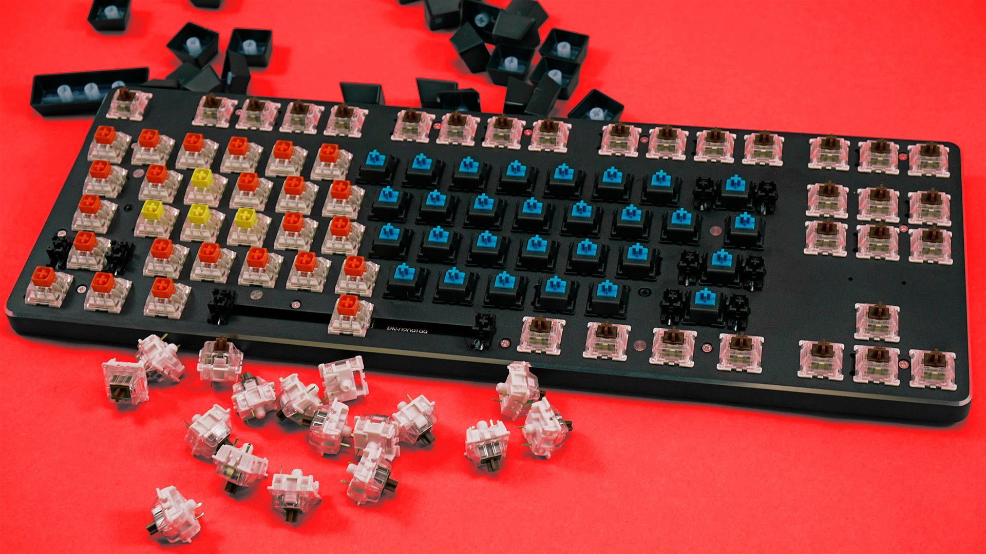 The GMMK keyboard with a variety of switches installed. 