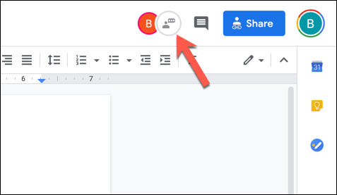 In an open Google Docs document with multiple active editors, press the &quot;Show Chat&quot; icon in the top-right corner.