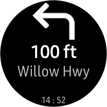 An &quot;Awesome Navigator&quot; direction on a Samsung smartwatch screen to turn left on &quot;Willow Hwy&quot; in &quot;100 ft.&quot; 