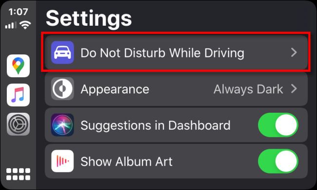 Tap "Do Not Disturb While Driving" in Apple CarPlay Settings.
