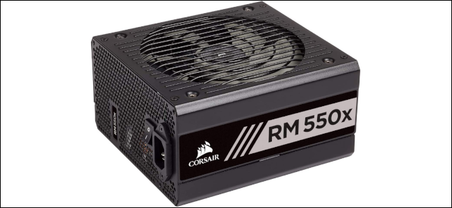A black Corsair power supply on a white background.